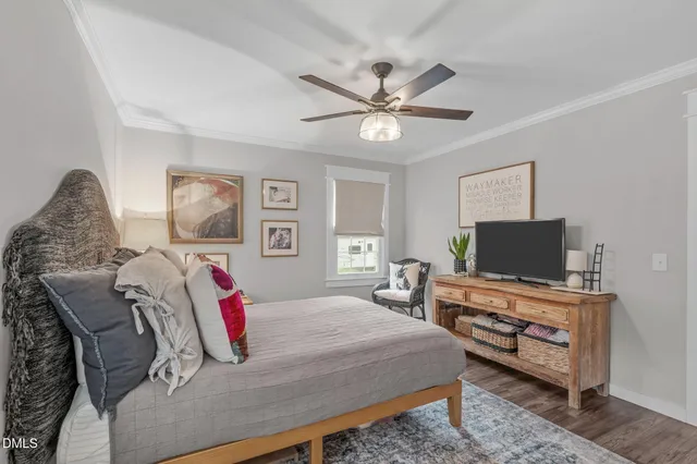a bathroom with a sink a mirror and a shower curtain