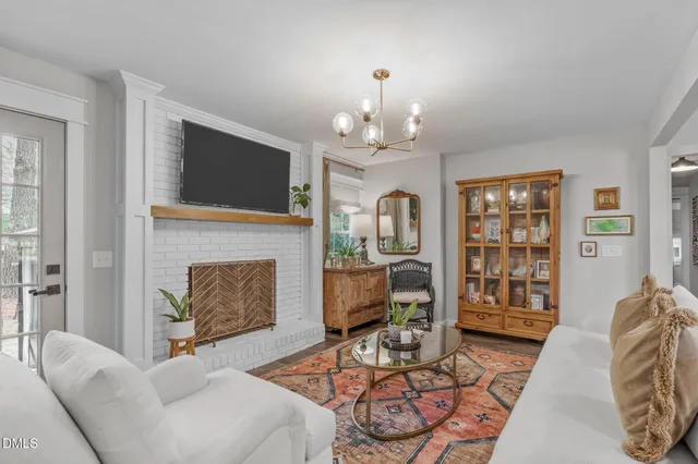 a dining hall with stainless steel appliances granite countertop a stove and a refrigerator