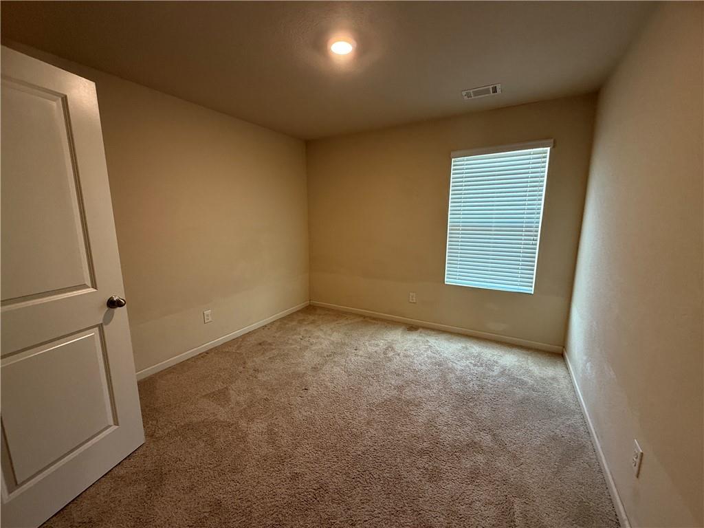 906 Independence Avenue Pendergrass, GA 30567 - Photo 13 of 14 an empty room with windows