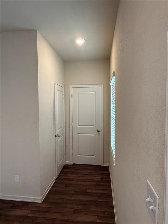 906 Independence Avenue Pendergrass, GA 30567 - Photo 3 of 14 a view of a hallway with wooden floor