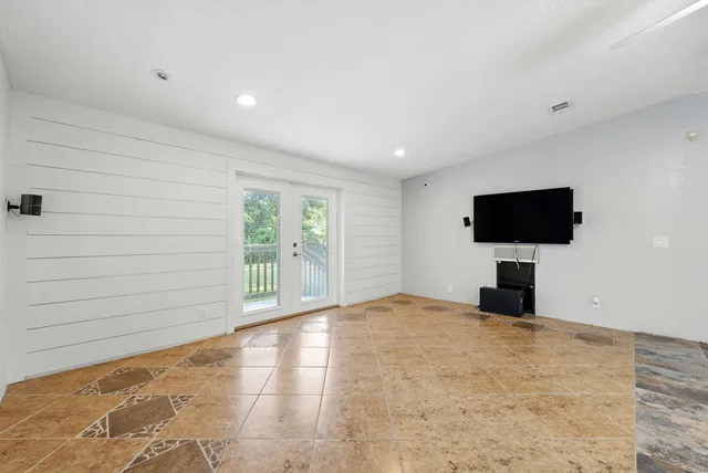 a view of livingroom with flat screen tv