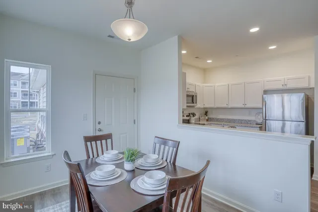 a view of a dining room with furniture