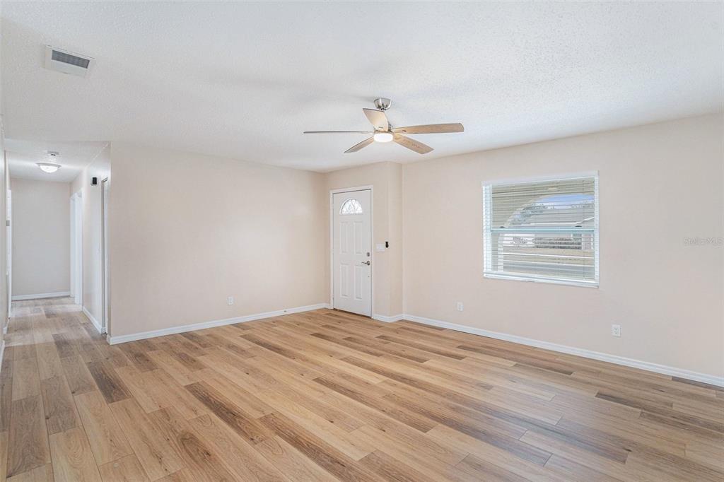 2527 Ridge Top Way Valrico, FL 33594 - Photo 4 of 29 a view of an empty room with a window