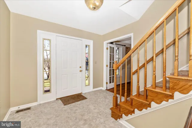 a view of an entryway with staircase