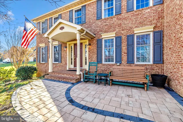 a front view of a house with a patio