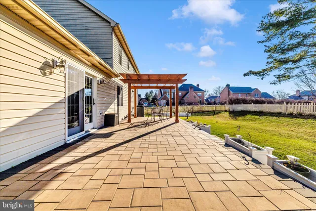 a view of swimming pool with outdoor space and seating area
