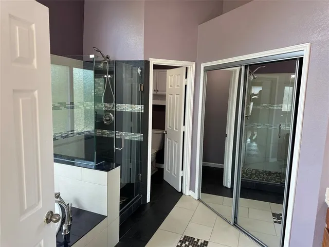 a backyard of a house with yard and outdoor seating