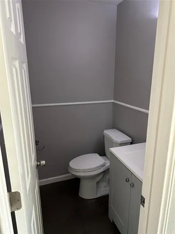 a bathroom with a toilet and a sink