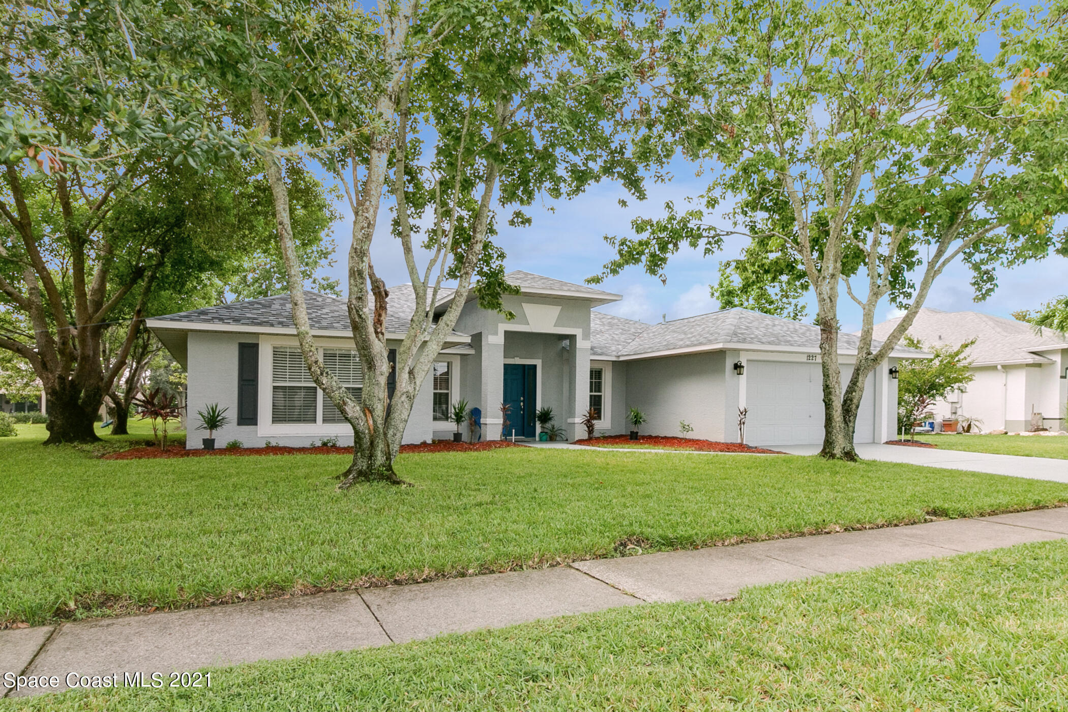 1227 Winding Meadows Road Rockledge, FL 32955 - Photo 2 of 36 front