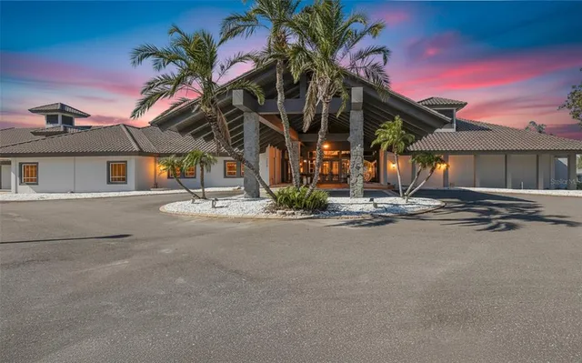 a view of a lobby with furniture and a chandelier