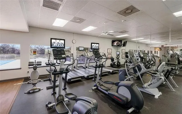 an aerial view of a house with a lake view