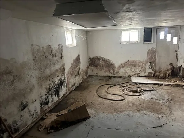 a room with table and chairs