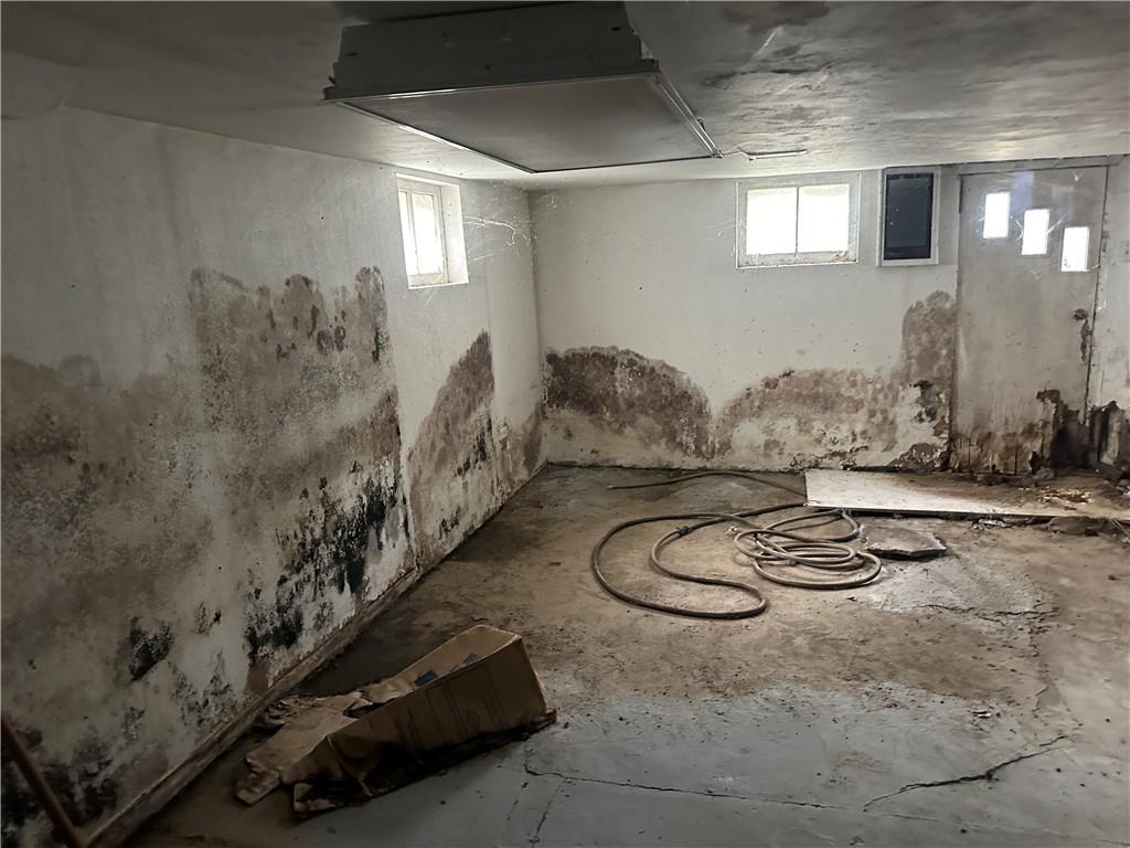 1034 Logan Road North Versailles, PA 15137 - Photo 14 of 18 a room with table and chairs