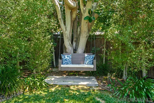 a view of a street with trees