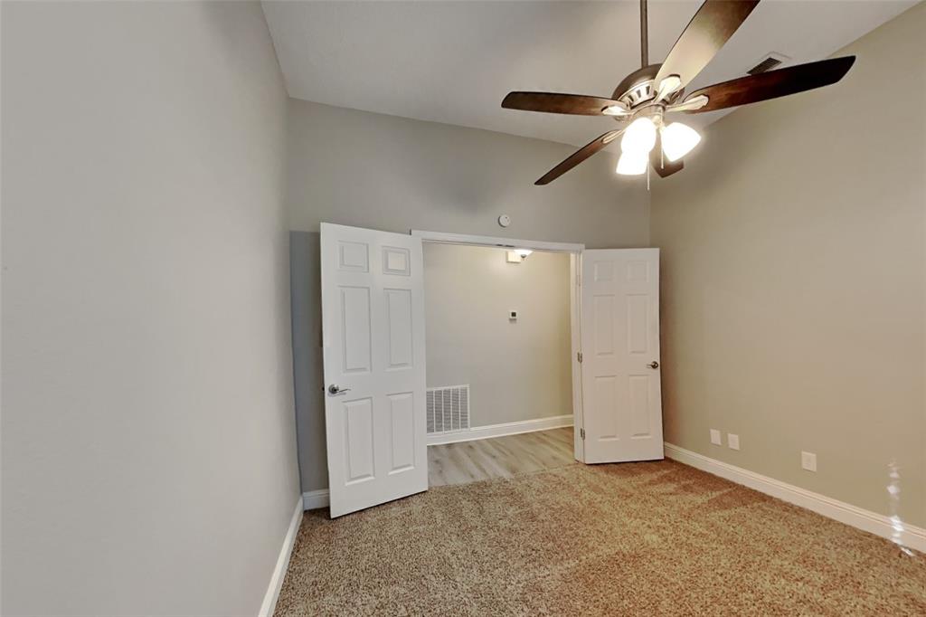 1009 Schrade Trail Mesquite, TX 75181 - Photo 10 of 19 Unfurnished room with light carpet and a ceiling fan