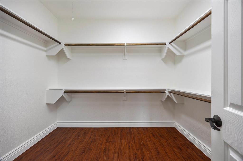 1908 Signal Ridge Place Rockwall, TX 75032 - Photo 14 of 28 a view of an empty walk in closet