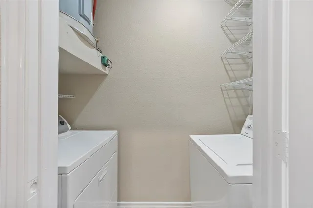 a bathroom with a sink and vanity