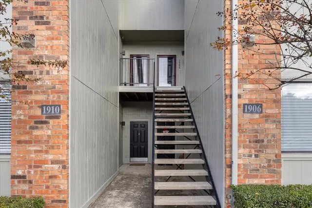 a view of a hall with stairs