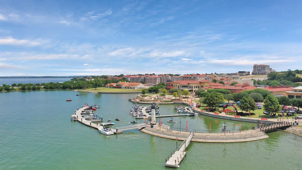 1908 Signal Ridge Place Rockwall, TX 75032 - Photo 23 of 28 a view of a lake with a nearby beach