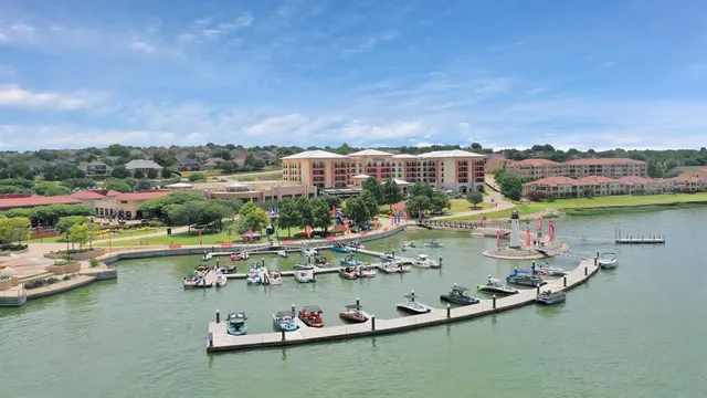 a view of a city with lawn chairs