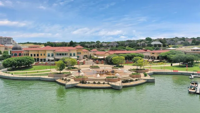 a view of a lake with residential houses