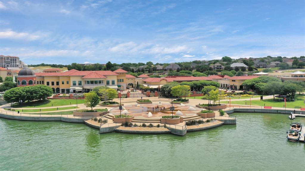 1908 Signal Ridge Place Rockwall, TX 75032 - Photo 25 of 28 a view of a lake with residential houses