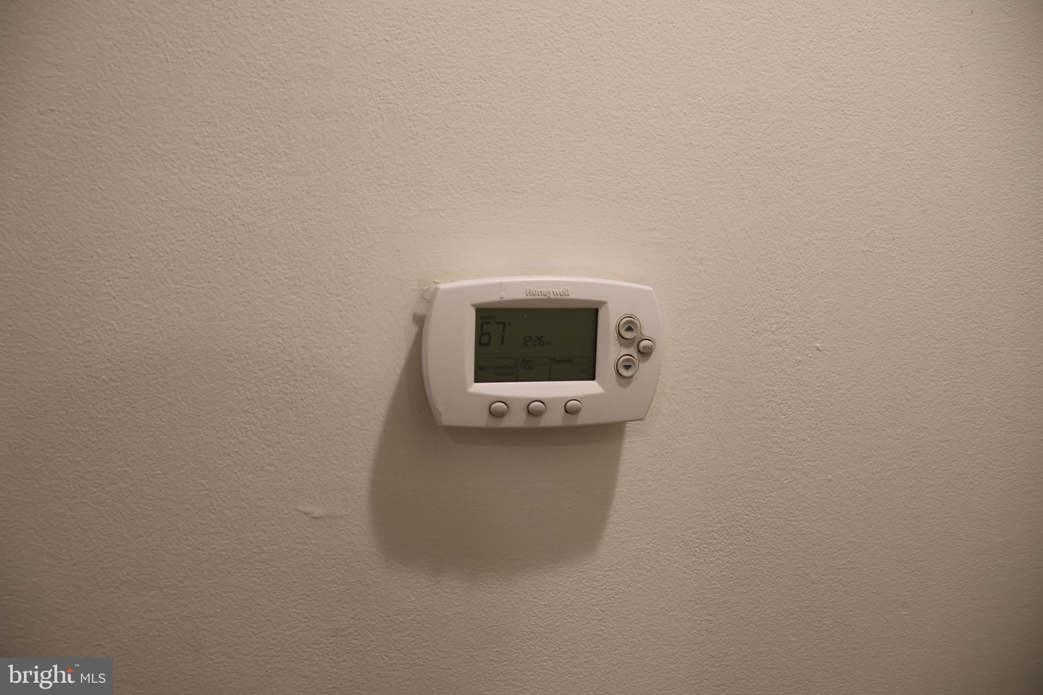 33 South 19th Street Philadelphia, PA 19103 - Photo 13 of 25 a room with a wall and a microwave