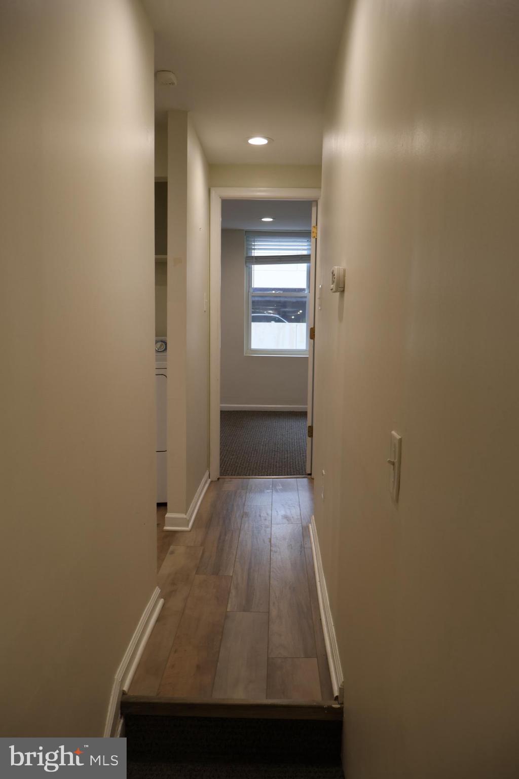 33 South 19th Street Philadelphia, PA 19103 - Photo 8 of 25 a view of a hallway with wooden floor