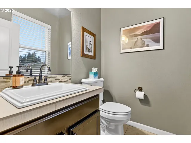 a view of a workspace with furniture