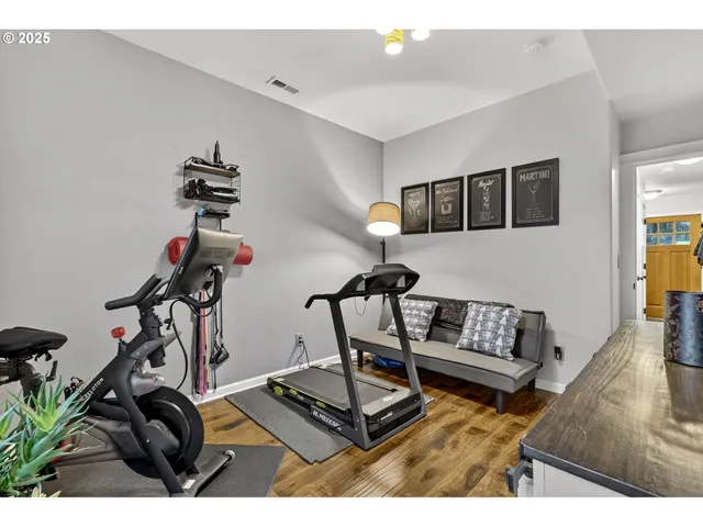 a view of a chairs and table in a balcony