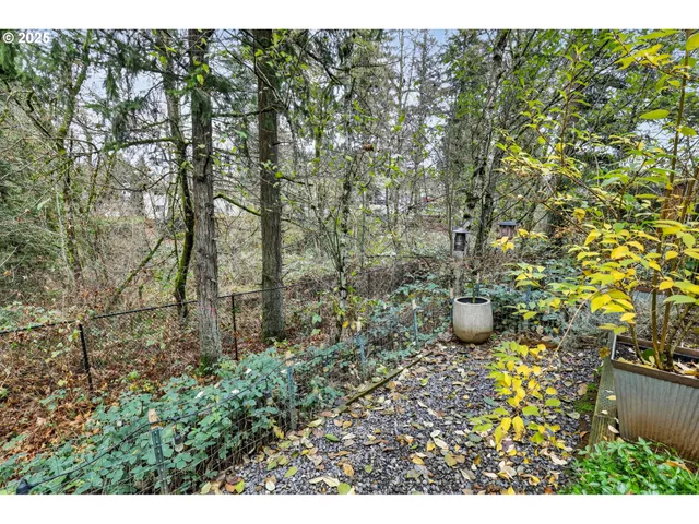 a view of a big room with table and chairs