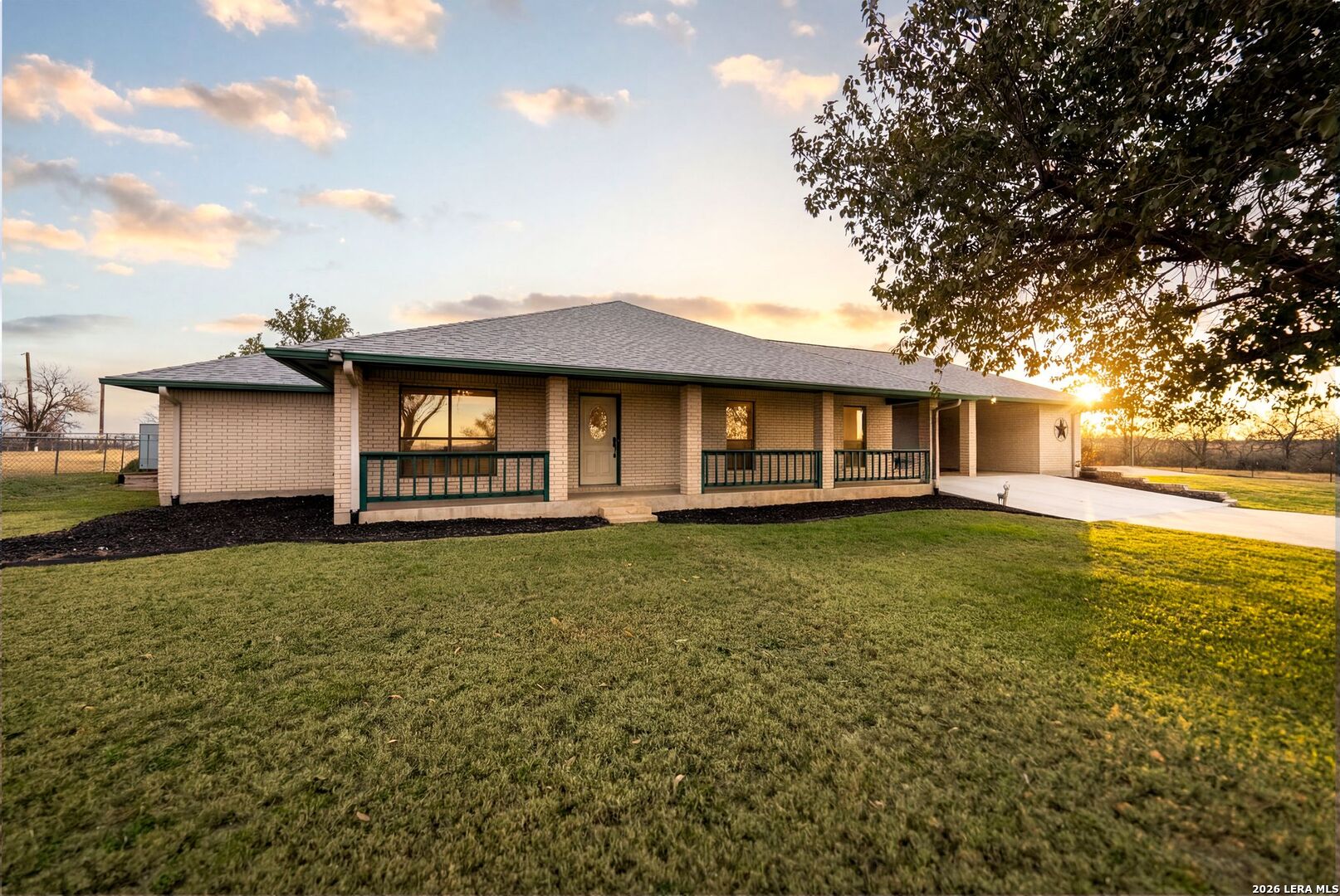 14320 La Vernia Road St. Hedwig, TX 78152 - Photo 3 of 71 a front view of a house with a garden