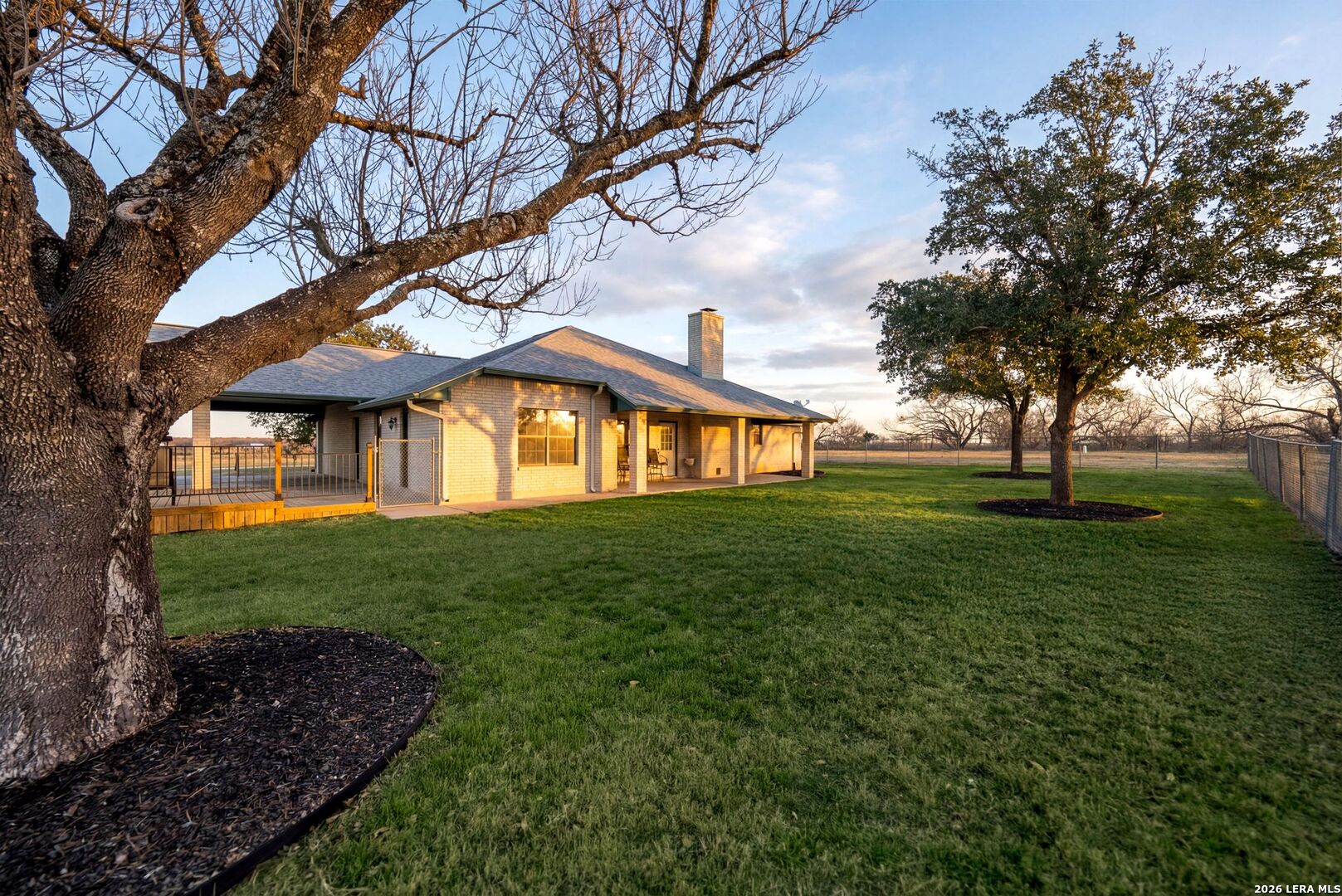 14320 La Vernia Road St. Hedwig, TX 78152 - Photo 34 of 71 a view of a house with a yard
