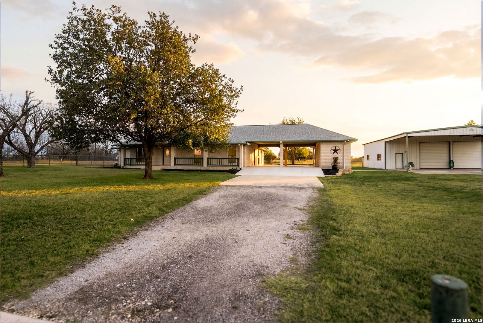 14320 La Vernia Road St. Hedwig, TX 78152 - Photo 4 of 71 a front view of a house with garden