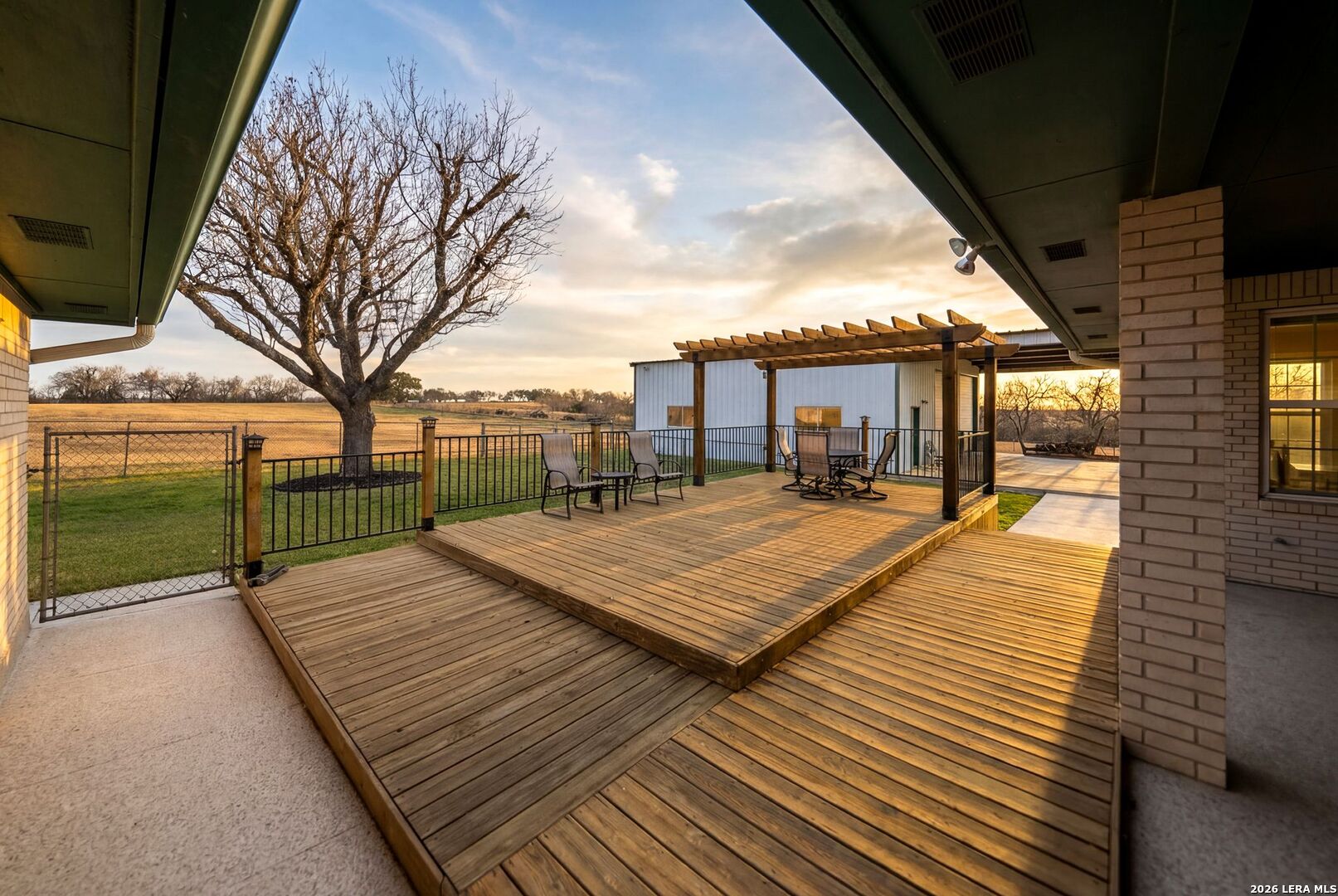 14320 La Vernia Road St. Hedwig, TX 78152 - Photo 42 of 71 a view of a wooden deck with a yard