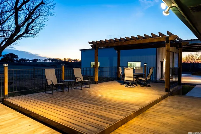 an aerial view of a house with lake view