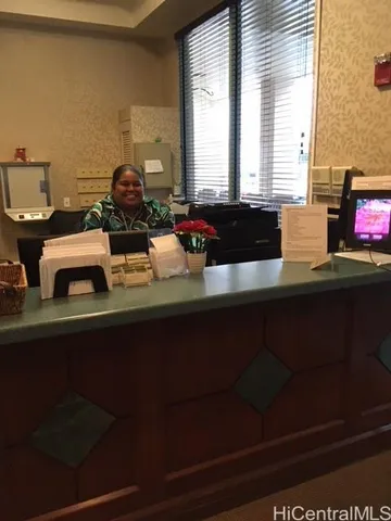 a kitchen with a sink cabinets and window