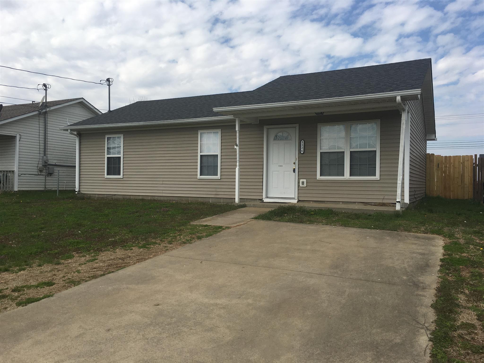 1126 Timothy Avenue Oak Grove, KY 42262 - Photo 2 of 12 front view of a house with a yard