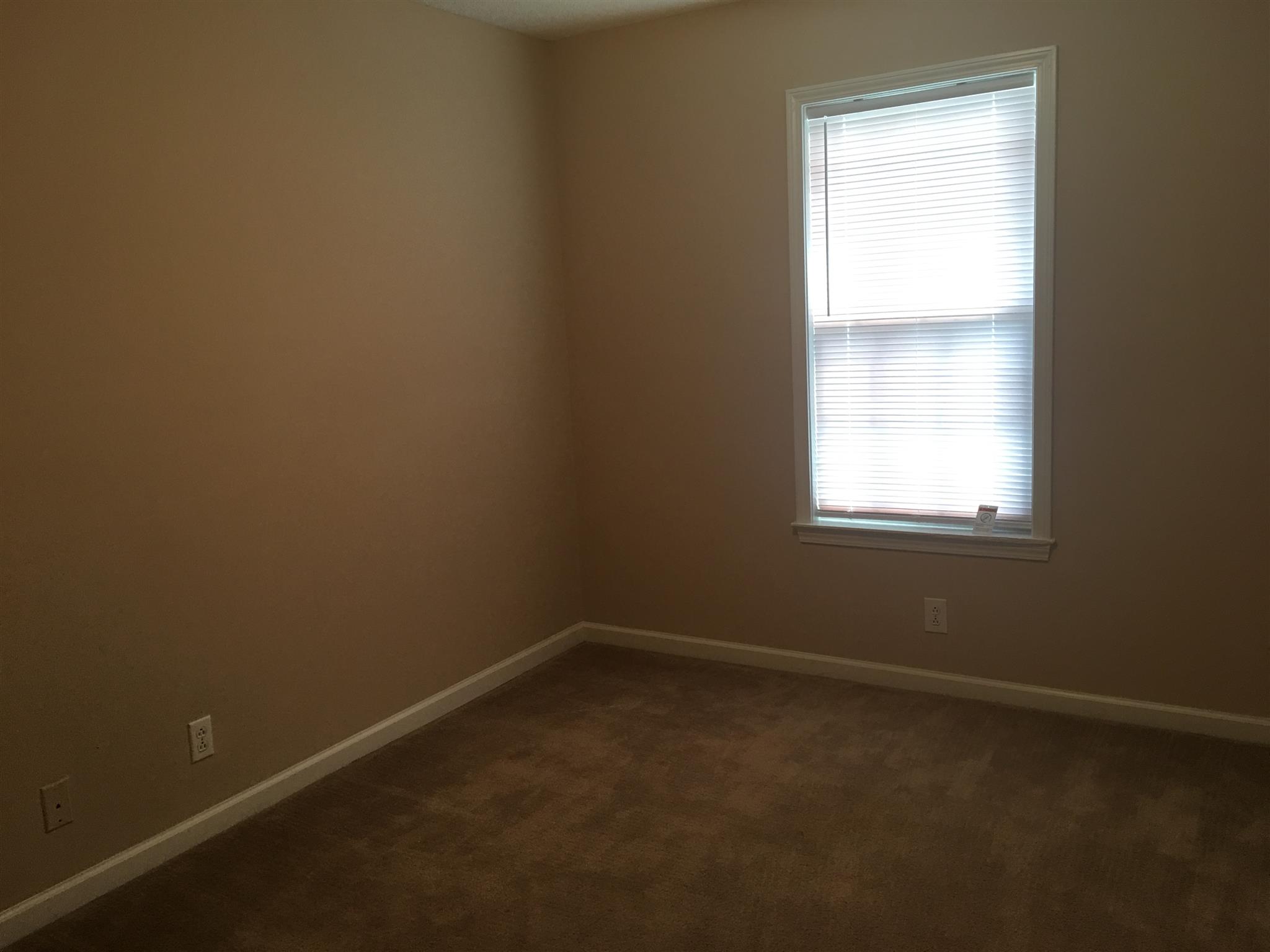 1126 Timothy Avenue Oak Grove, KY 42262 - Photo 8 of 12 an empty room with a window