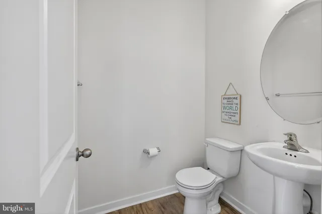 a stove top oven sitting inside of a kitchen