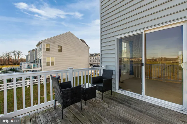 a view of a big house with a yard