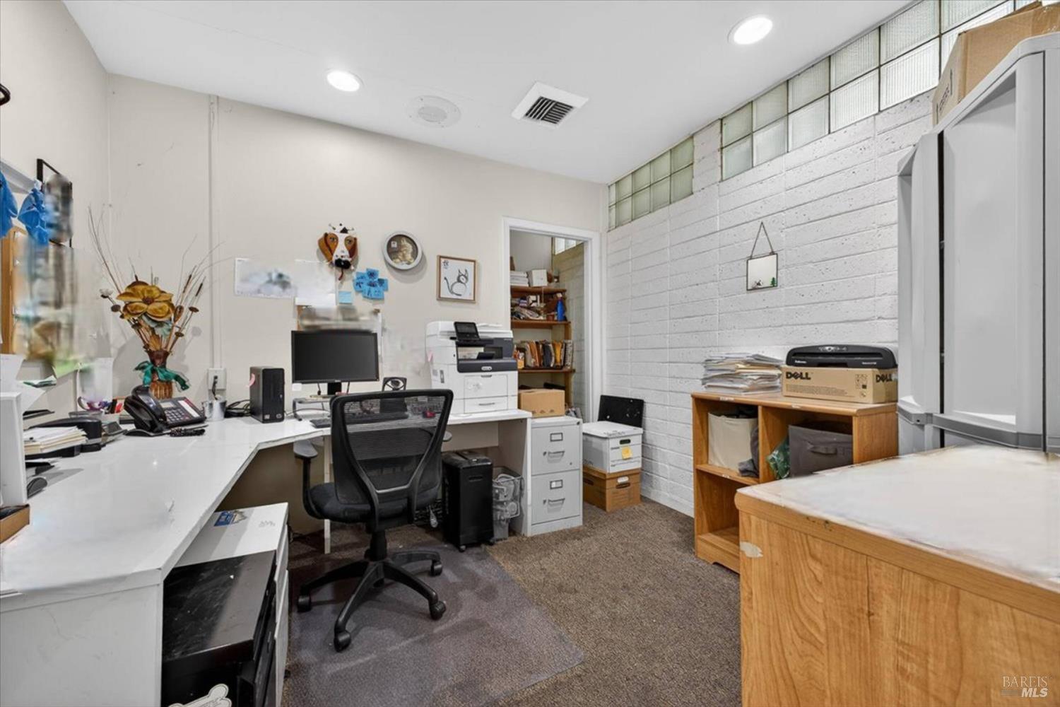 5341 Sebastopol Road Santa Rosa, CA 95407 - Photo 7 of 12 a view of a workspace with furniture and a kitchen