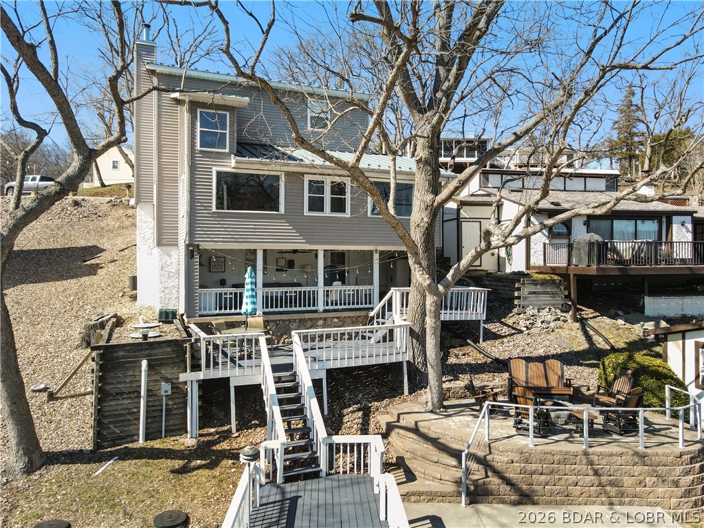44 Oasis Point Camdenton, MO 65020 - Photo 11 of 55 The tiered decking makes navigating the outside a