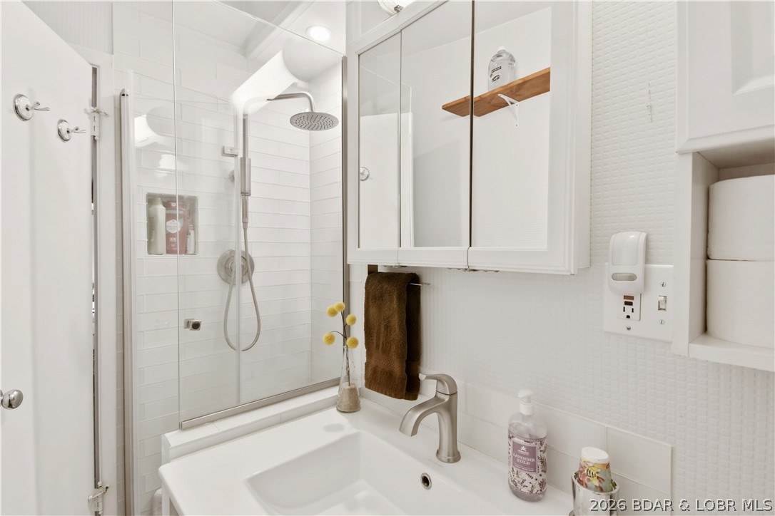 44 Oasis Point Camdenton, MO 65020 - Photo 21 of 55 The downstairs bathroom has been updated with a ne