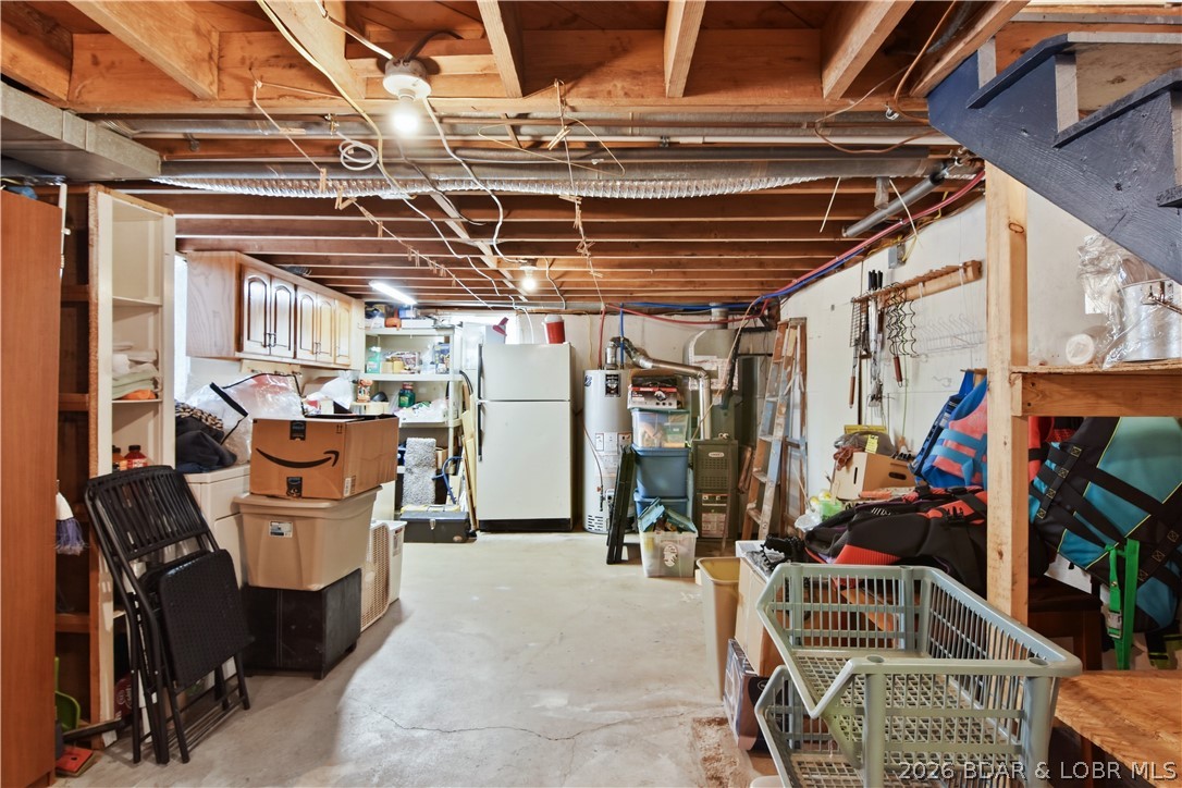 44 Oasis Point Camdenton, MO 65020 - Photo 9 of 55 Unfinished basement. Tons of room for storage or