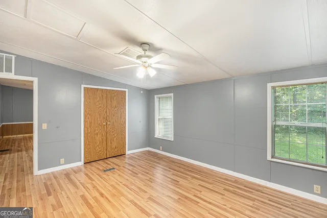 a view of a room with a large window