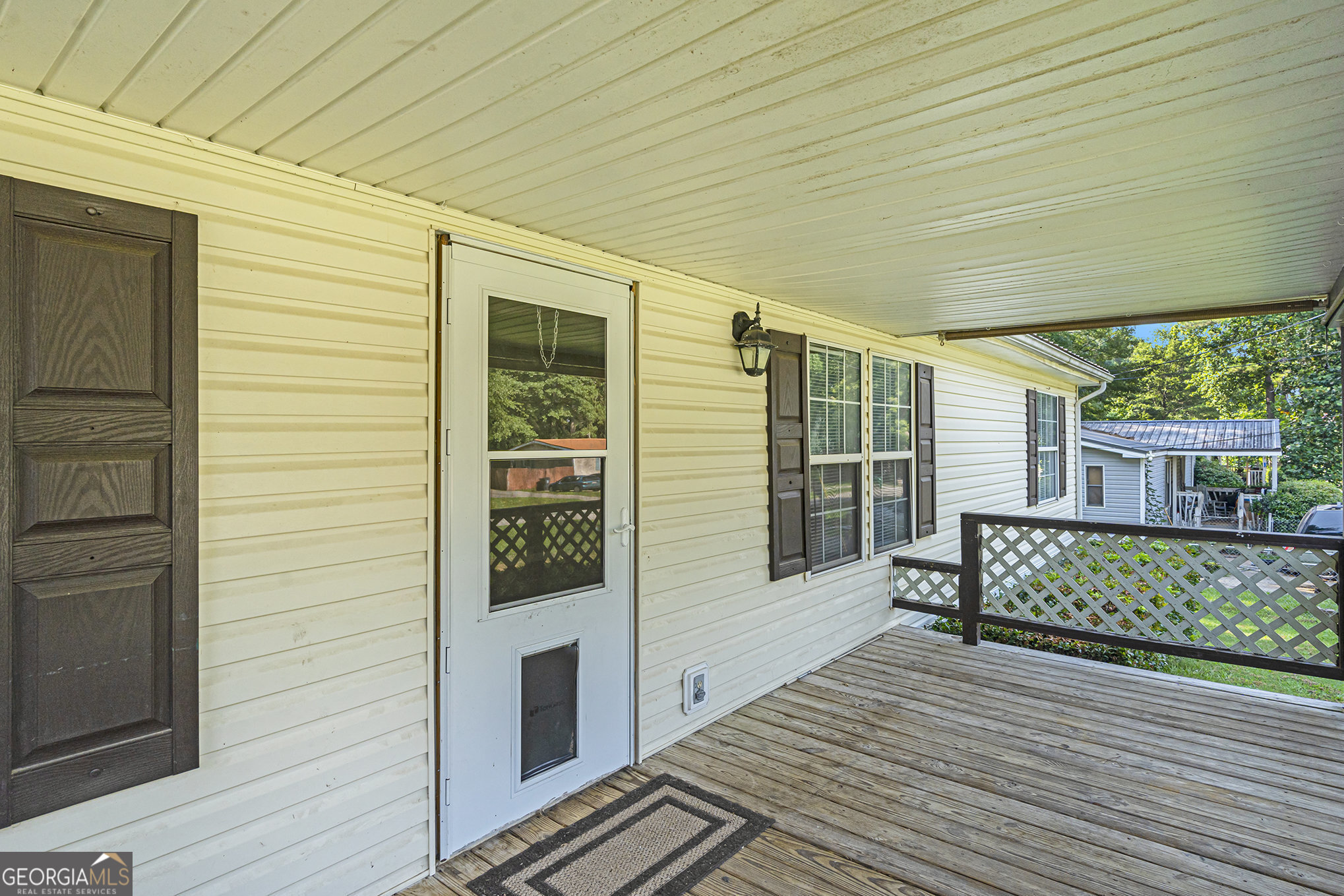 340 Loblolly Ridge Locust Grove, GA 30248 - Photo 5 of 26 a view of a house with brick walls