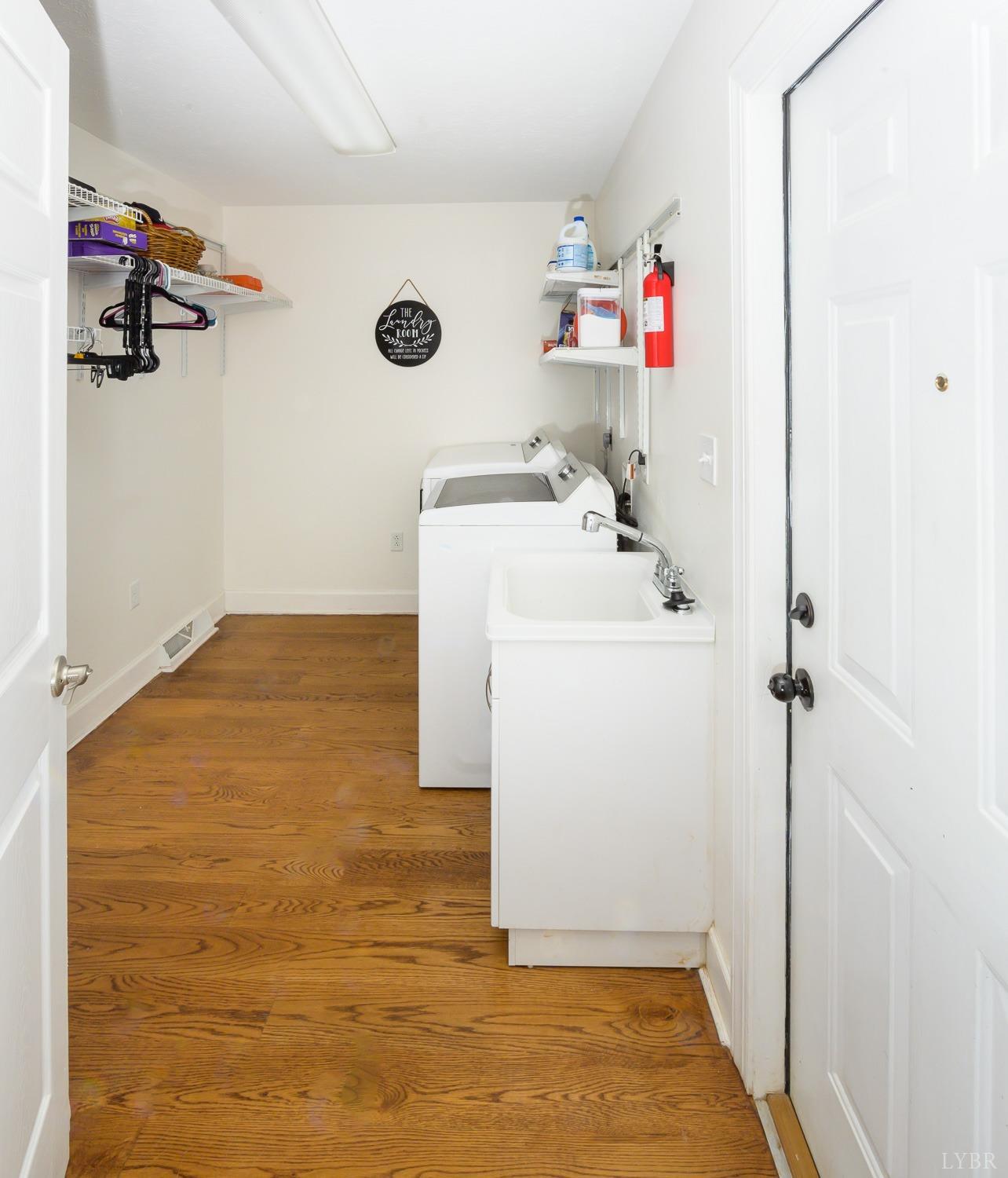 149 Locust Street Amherst, VA 24521 - Photo 11 of 86 a utility room with dryer and washer