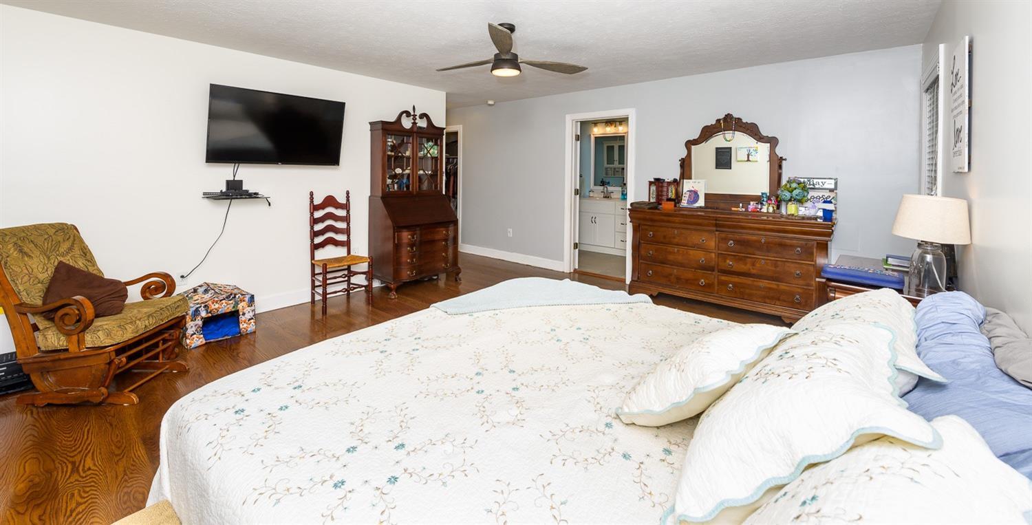 149 Locust Street Amherst, VA 24521 - Photo 31 of 86 a bedroom with a bed and a flat screen tv