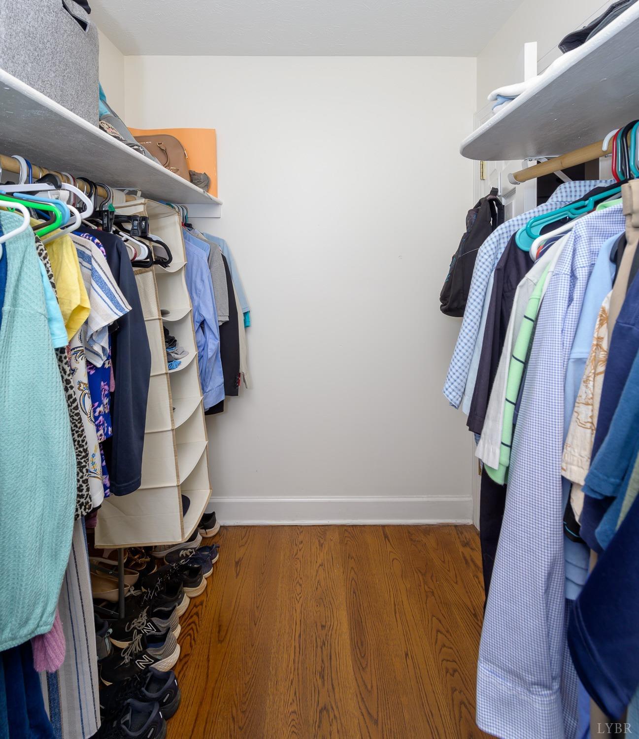 149 Locust Street Amherst, VA 24521 - Photo 36 of 86 a view of walk in closet with clothes and shoes